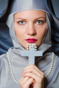 Young nun in religious concept